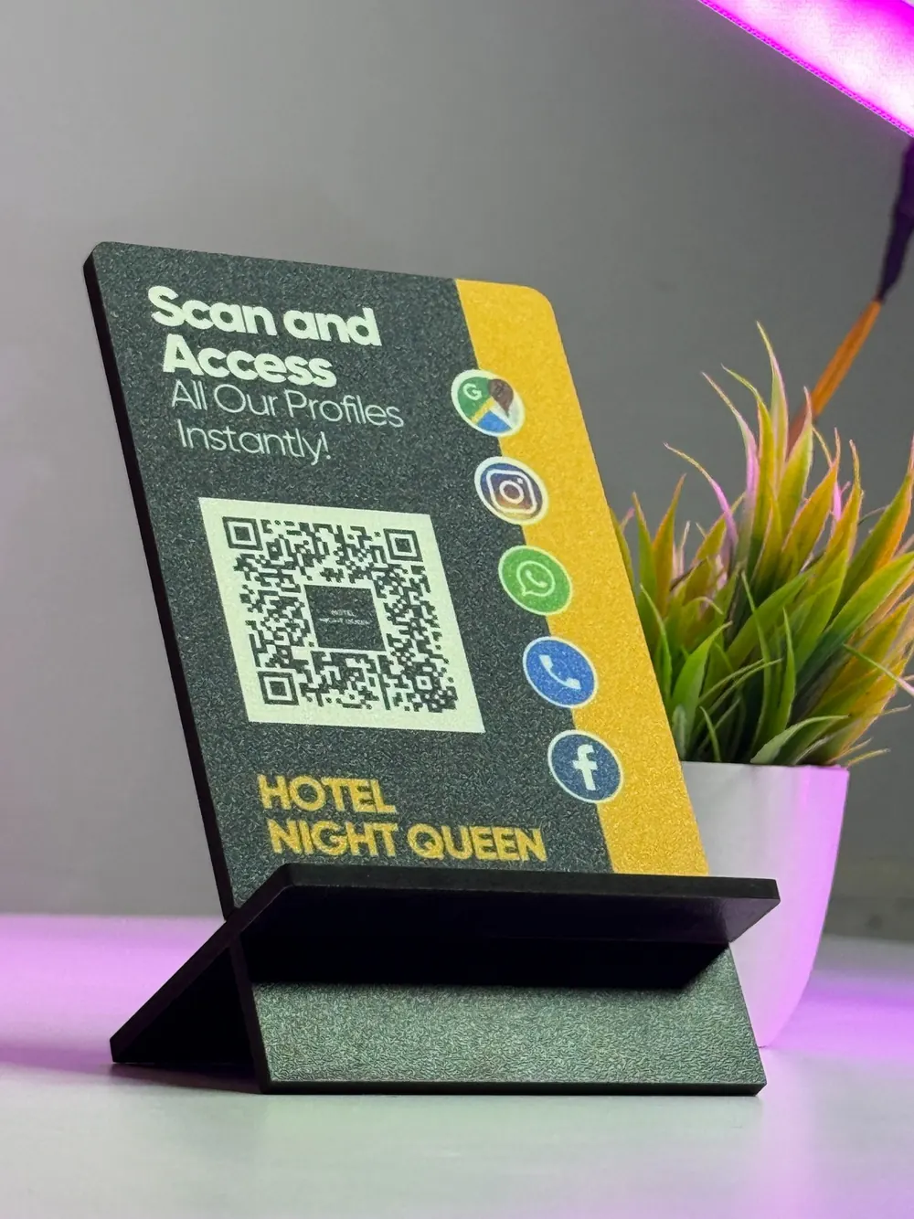 Hotel ScanEra standee with plant